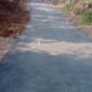 Pengaspalan jalan ruas Miramontana–Bojongjengkol.